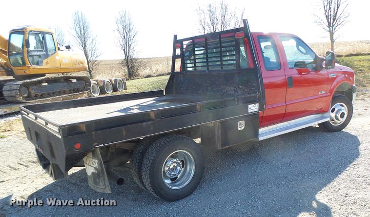 image for item DB9874 2006 Ford F350 Super Duty SuperCab flatbed pickup truck