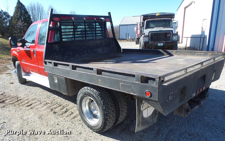 image for item DB9874 2006 Ford F350 Super Duty SuperCab flatbed pickup truck