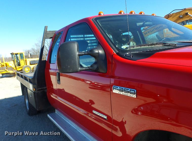 image for item DB9874 2006 Ford F350 Super Duty SuperCab flatbed pickup truck