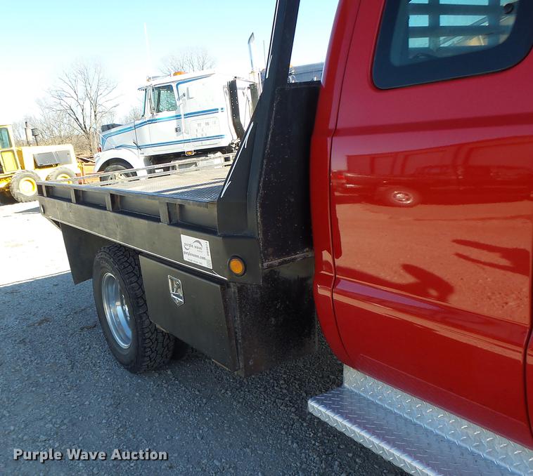 image for item DB9874 2006 Ford F350 Super Duty SuperCab flatbed pickup truck