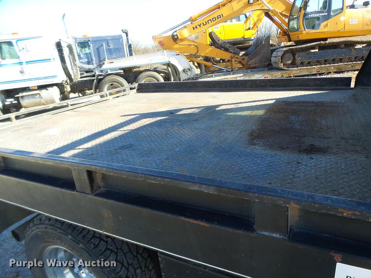 image for item DB9874 2006 Ford F350 Super Duty SuperCab flatbed pickup truck