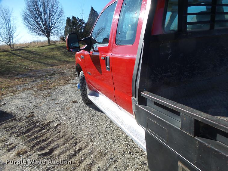 image for item DB9874 2006 Ford F350 Super Duty SuperCab flatbed pickup truck