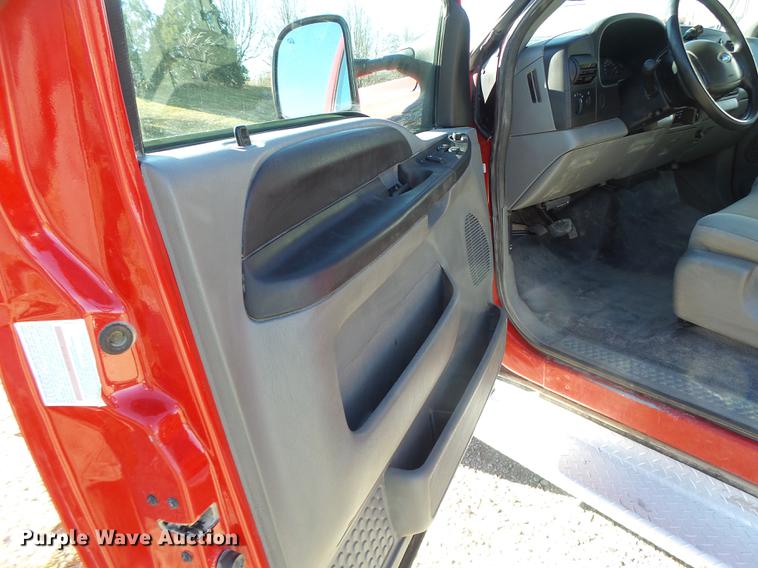 image for item DB9874 2006 Ford F350 Super Duty SuperCab flatbed pickup truck