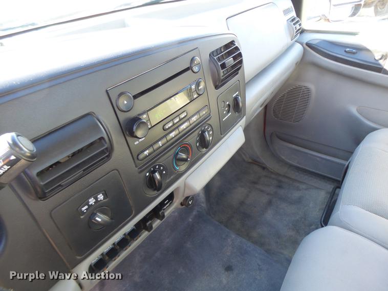 image for item DB9874 2006 Ford F350 Super Duty SuperCab flatbed pickup truck