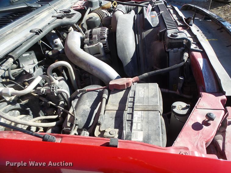 image for item DB9874 2006 Ford F350 Super Duty SuperCab flatbed pickup truck