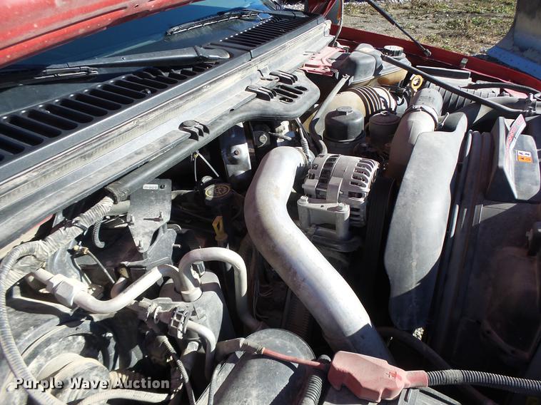 image for item DB9874 2006 Ford F350 Super Duty SuperCab flatbed pickup truck