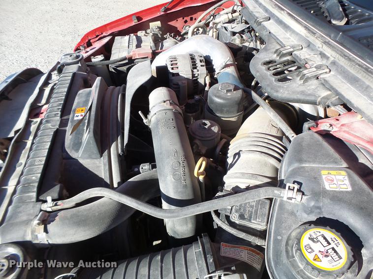 image for item DB9874 2006 Ford F350 Super Duty SuperCab flatbed pickup truck