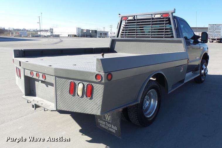 image for item DB9888 2006 Ford F350 Super Duty flatbed pickup truck