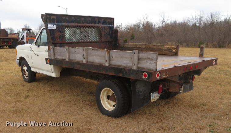 image for item DC0775 1991 Ford F350 flatbed pickup truck