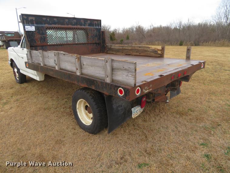 image for item DC0775 1991 Ford F350 flatbed pickup truck