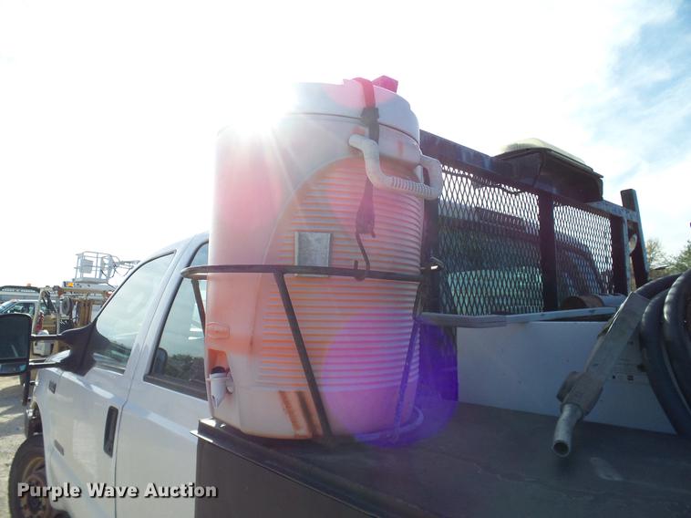 image for item DC2201 2004 Ford F550 Crew Cab flatbed truck