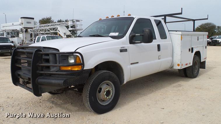 image for item DC2202 1999 Ford F350 Super Duty SuperCab utility bed pickup truck