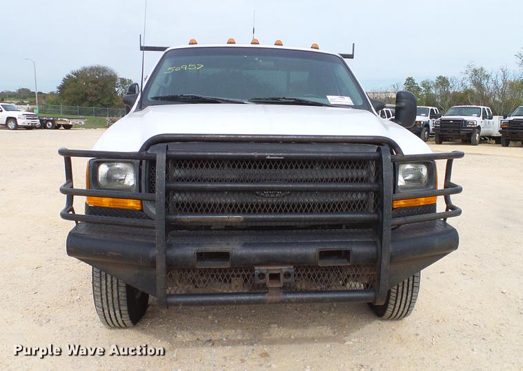 image for item DC2202 1999 Ford F350 Super Duty SuperCab utility bed pickup truck