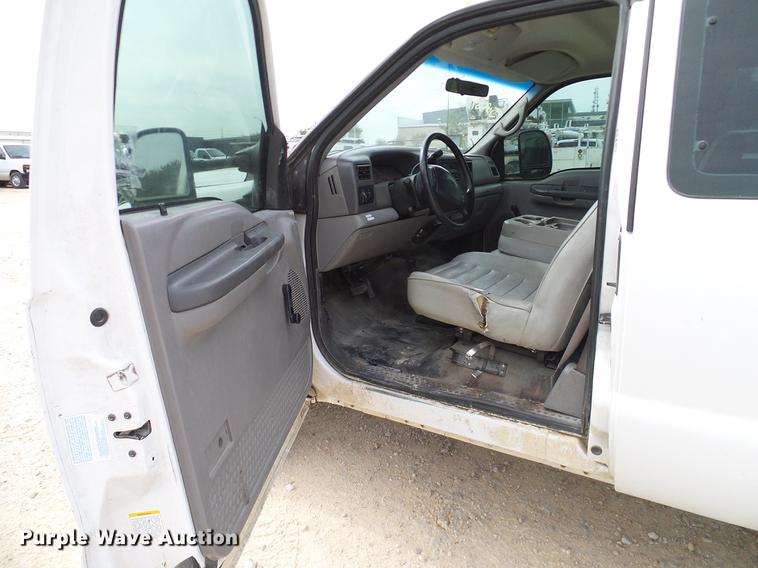 image for item DC2202 1999 Ford F350 Super Duty SuperCab utility bed pickup truck