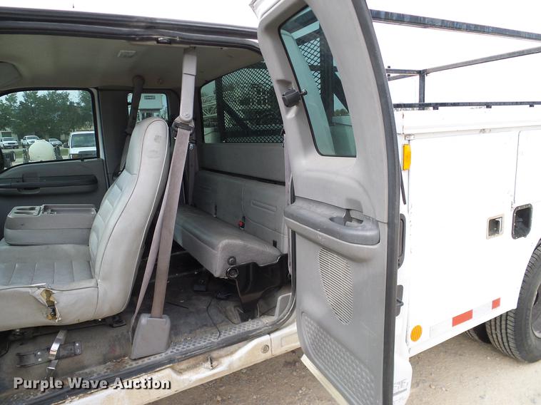 image for item DC2202 1999 Ford F350 Super Duty SuperCab utility bed pickup truck