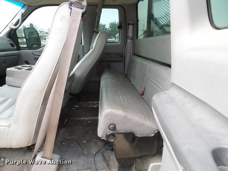 image for item DC2202 1999 Ford F350 Super Duty SuperCab utility bed pickup truck