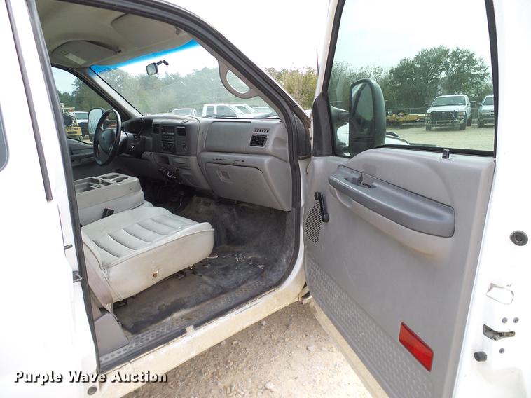 image for item DC2202 1999 Ford F350 Super Duty SuperCab utility bed pickup truck