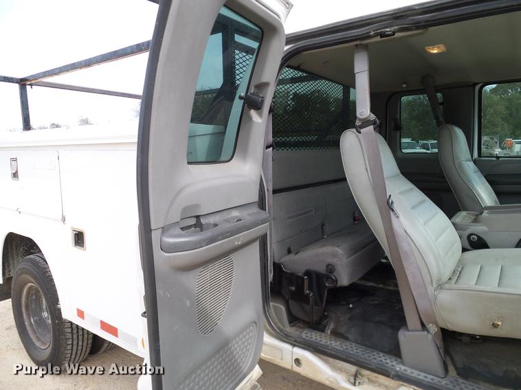 image for item DC2202 1999 Ford F350 Super Duty SuperCab utility bed pickup truck