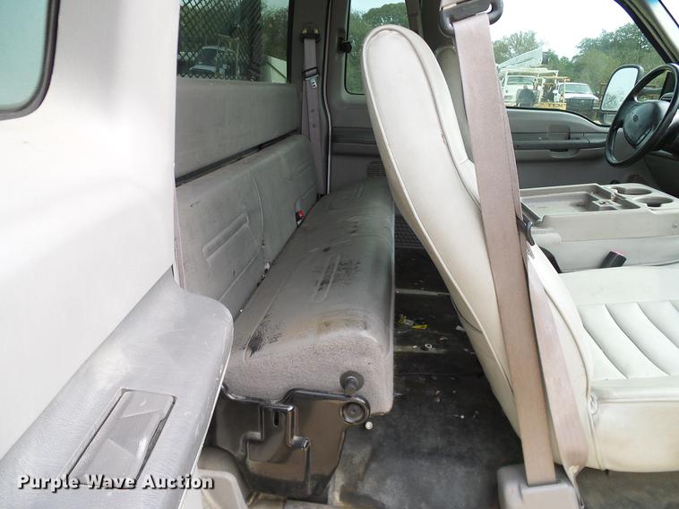 image for item DC2202 1999 Ford F350 Super Duty SuperCab utility bed pickup truck