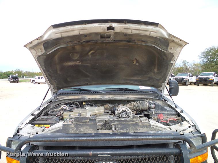 image for item DC2202 1999 Ford F350 Super Duty SuperCab utility bed pickup truck