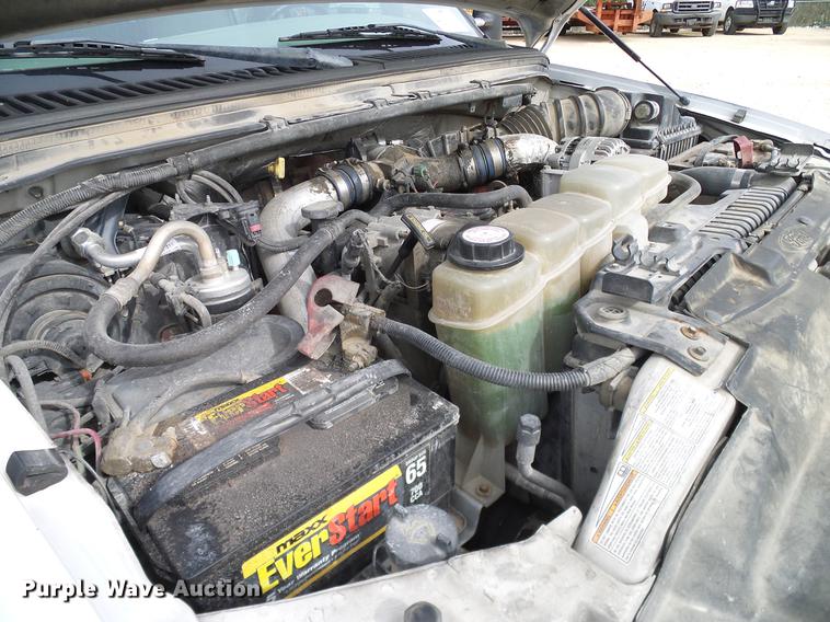 image for item DC2202 1999 Ford F350 Super Duty SuperCab utility bed pickup truck