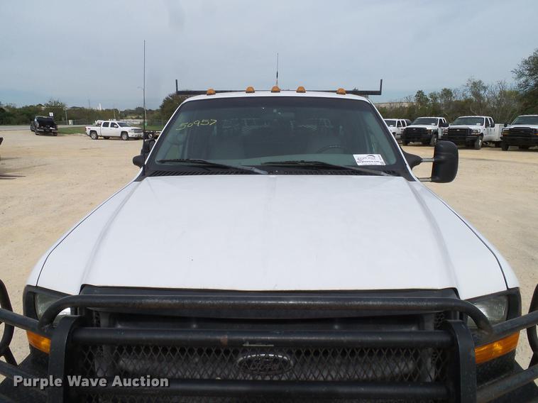 image for item DC2202 1999 Ford F350 Super Duty SuperCab utility bed pickup truck