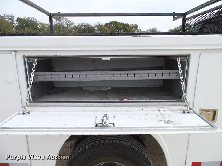 image for item DC2202 1999 Ford F350 Super Duty SuperCab utility bed pickup truck