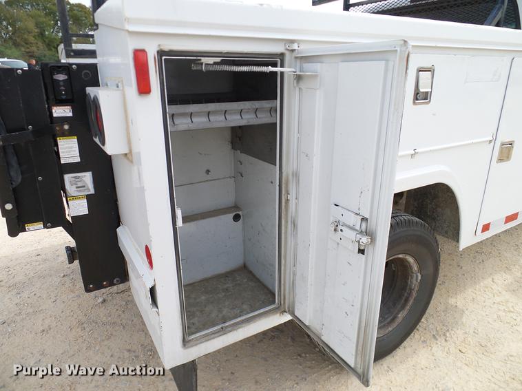 image for item DC2202 1999 Ford F350 Super Duty SuperCab utility bed pickup truck