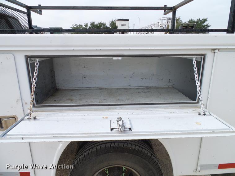 image for item DC2202 1999 Ford F350 Super Duty SuperCab utility bed pickup truck