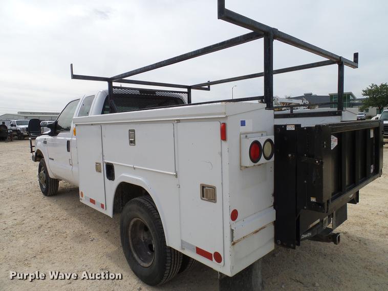 image for item DC2202 1999 Ford F350 Super Duty SuperCab utility bed pickup truck
