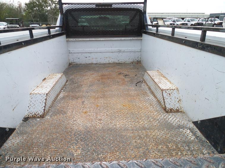 image for item DC2202 1999 Ford F350 Super Duty SuperCab utility bed pickup truck