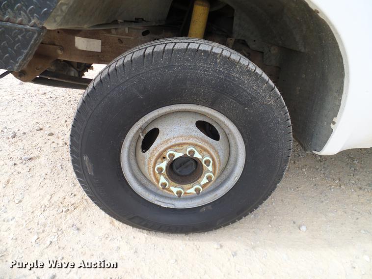 image for item DC2202 1999 Ford F350 Super Duty SuperCab utility bed pickup truck