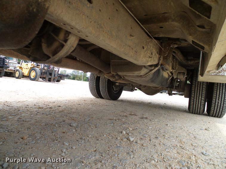 image for item DC2202 1999 Ford F350 Super Duty SuperCab utility bed pickup truck