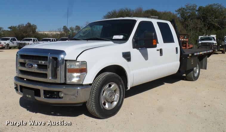 image for item DC2218 2010 Ford F250 Super Duty Crew Cab flatbed pickup truck