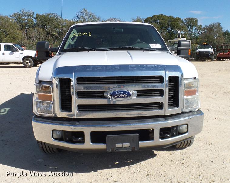 image for item DC2218 2010 Ford F250 Super Duty Crew Cab flatbed pickup truck