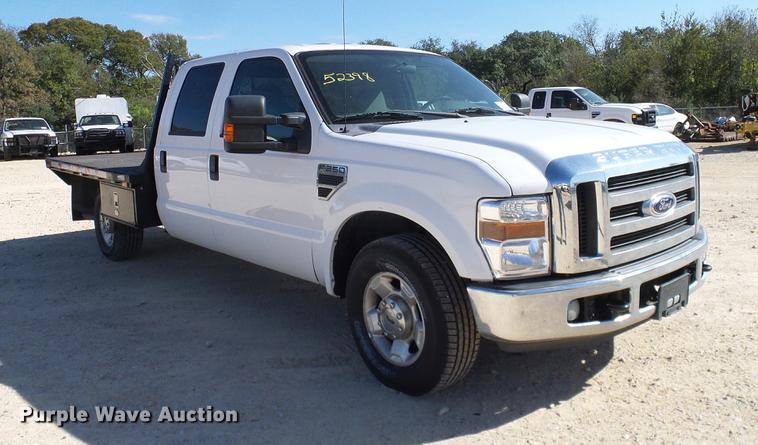 image for item DC2218 2010 Ford F250 Super Duty Crew Cab flatbed pickup truck