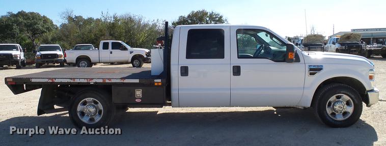 image for item DC2218 2010 Ford F250 Super Duty Crew Cab flatbed pickup truck