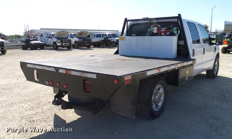 image for item DC2218 2010 Ford F250 Super Duty Crew Cab flatbed pickup truck