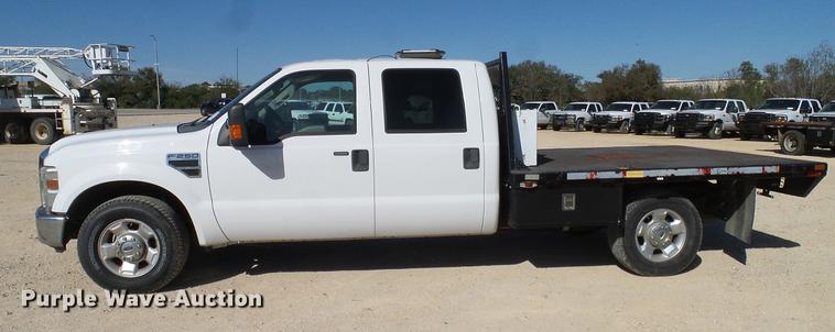 image for item DC2218 2010 Ford F250 Super Duty Crew Cab flatbed pickup truck
