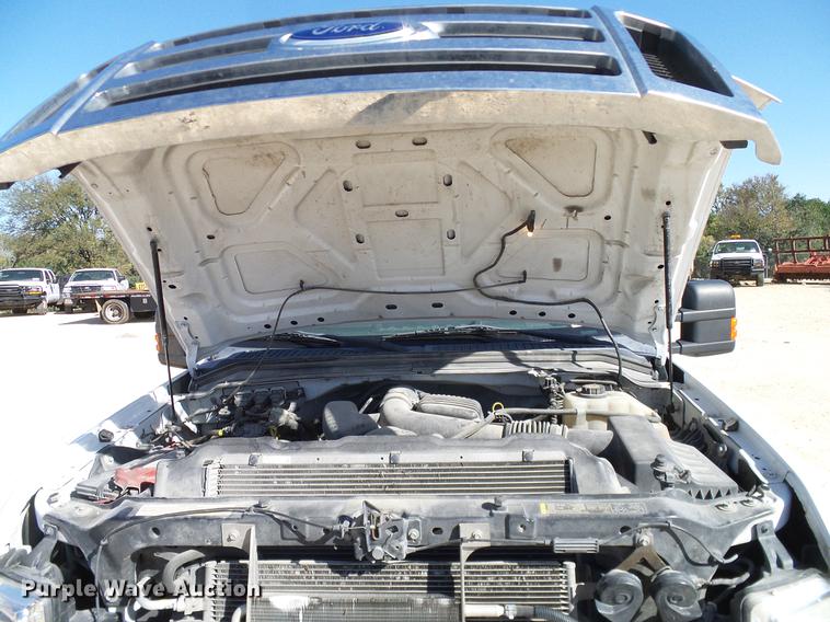 image for item DC2218 2010 Ford F250 Super Duty Crew Cab flatbed pickup truck