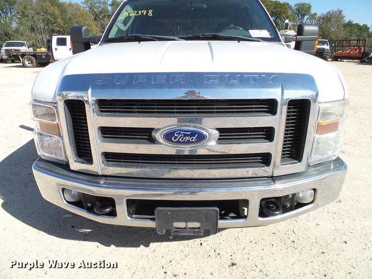 image for item DC2218 2010 Ford F250 Super Duty Crew Cab flatbed pickup truck