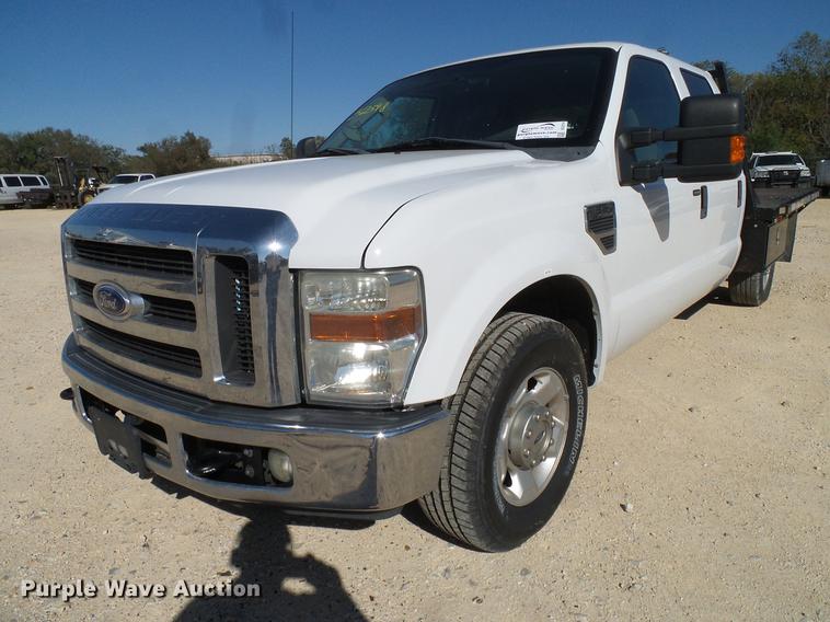 image for item DC2218 2010 Ford F250 Super Duty Crew Cab flatbed pickup truck