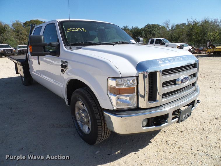 image for item DC2218 2010 Ford F250 Super Duty Crew Cab flatbed pickup truck