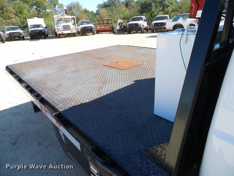 image for item DC2218 2010 Ford F250 Super Duty Crew Cab flatbed pickup truck