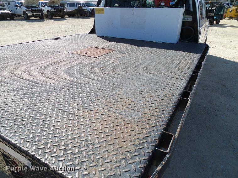 image for item DC2218 2010 Ford F250 Super Duty Crew Cab flatbed pickup truck