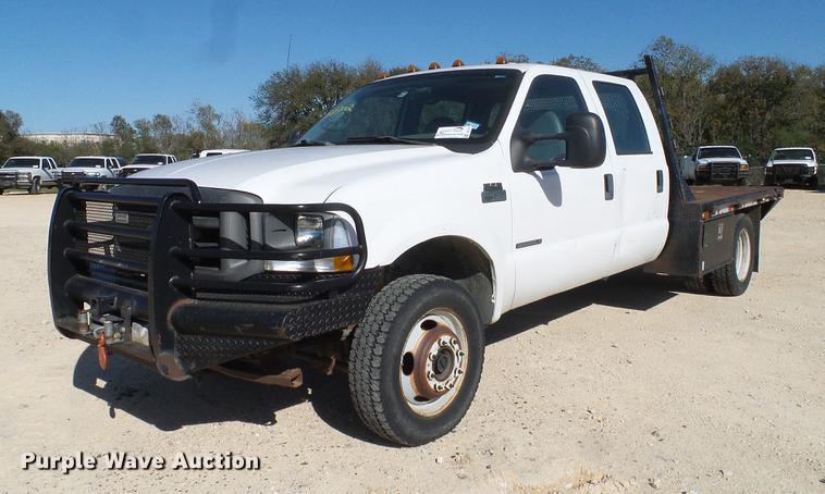 image for item DC2219 2002 Ford F450 Super Duty Crew Cab flatbed truck