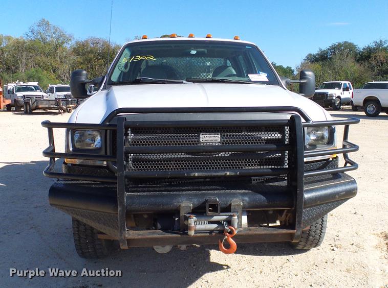 image for item DC2219 2002 Ford F450 Super Duty Crew Cab flatbed truck