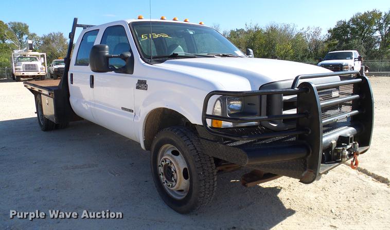 image for item DC2219 2002 Ford F450 Super Duty Crew Cab flatbed truck