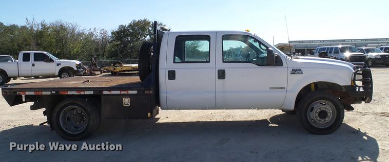 image for item DC2219 2002 Ford F450 Super Duty Crew Cab flatbed truck