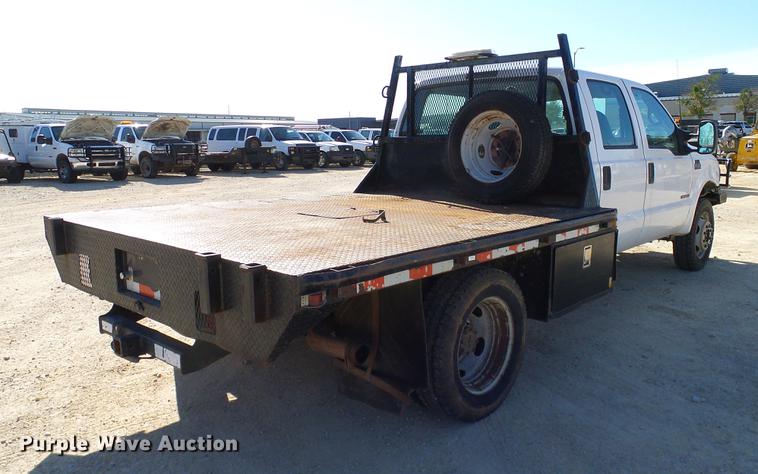 image for item DC2219 2002 Ford F450 Super Duty Crew Cab flatbed truck